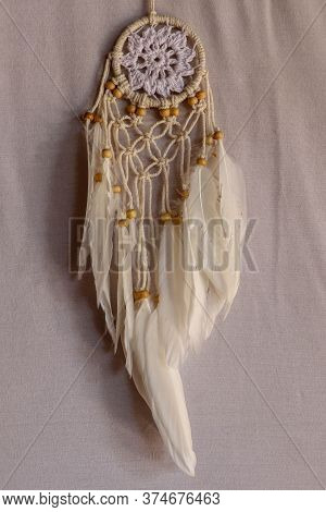 White Color Dream Catcher With White Feathers In The Interior. H