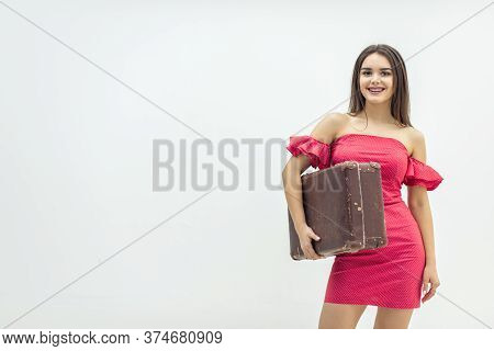 Young Old-fashioned Female In Summer Outfit Sitting Holding A Retro Suitcase Ready For Increadible V