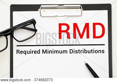 Paper With Required Minimum Distributions Rmd On A Table