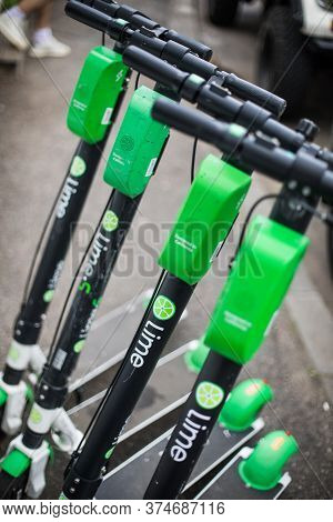 Bucarest, Romania - May 26. 20202: Image Of Some Lime-s E-scooters Parked On Sidewalk In Bucharest, 