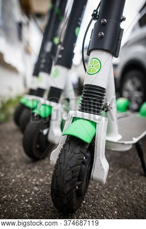 Bucarest, Romania - May 26. 20202: Image Of Some Lime-s E-scooters Parked On Sidewalk In Bucharest, 