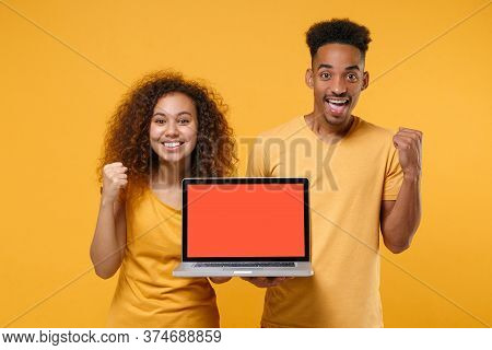 Happy Young Friends Couple African American Guy Girl In Casual Clothes Isolated On Yellow Background