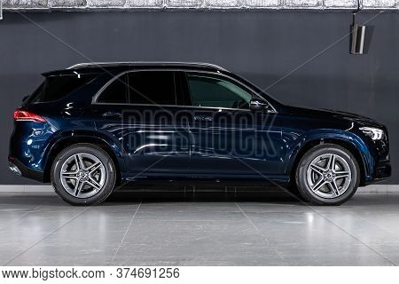 Novosibirsk/ Russia - April 21 2020: Blue Mercedes Benz Gle-class,  Mid-range Luxury Suv, Side View.