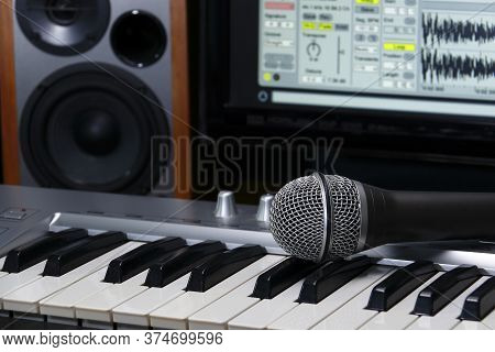 Home Recording Studio. Screen Keyboard, Speakers And Microphone.
