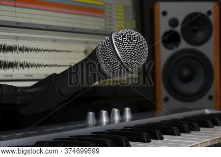Home Recording Studio. Screen Keyboard, Speakers And Microphone.