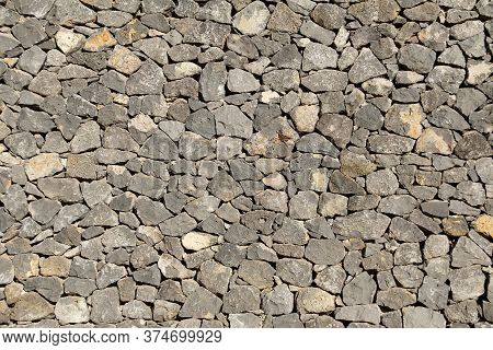 Background Of A Rustic Grey Stone Wall