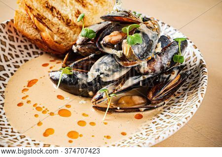 Plate of mussels with creme dubarry in restaurant