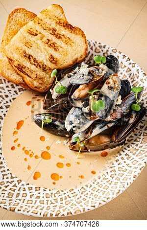 Plate of mussels with creme dubarry in restaurant