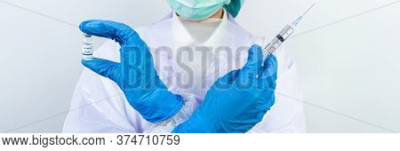 Doctor, Scientist, Researcher Hand In Blue Gloves Or Protective Suit Preparing For Human Clinical In