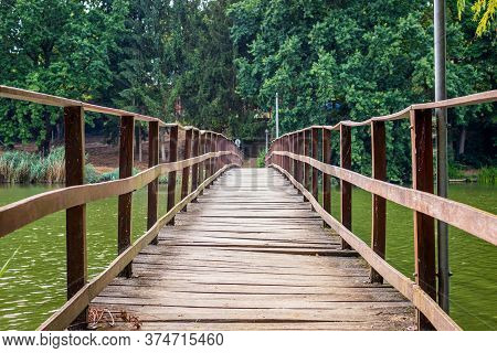 Old Wooden Bridge At Lake Gebart (gébárti-tó) In Zalaegerszeg, Hungary.