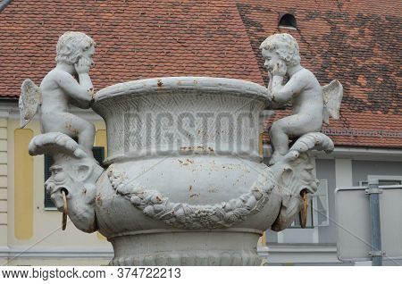 Angel Or Putto Figure In A Catholic Church, Sacred Cherub