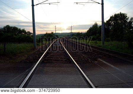 Double Track Line At The Railway At Sunset
