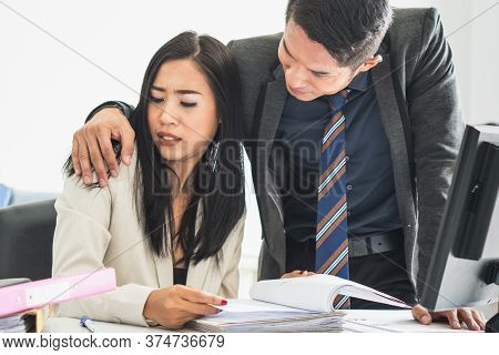 Sexsual Harassment In Workplace. Female Employee Looking At Hand Of Boss Touch At Her Shoulder And F