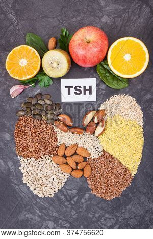 Inscription Tsh And Thyroid Shape Made Of Healthy Ingredients. Source Natural Vitamins And Minerals