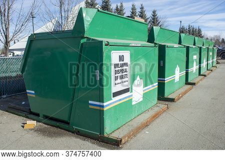Large Community Recycling Bins - Containers In Park Lot