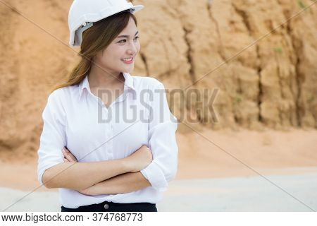 Asian Beautiful Lady Land Agent Surveying Land For Build Industrial  Factory Project.