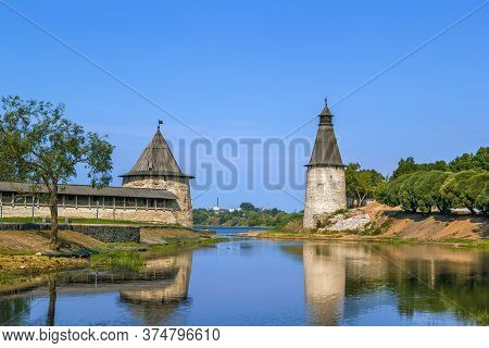 Tall And Flat Towers In Pskov Krom (kremlin), Russia, View From Pskova River
