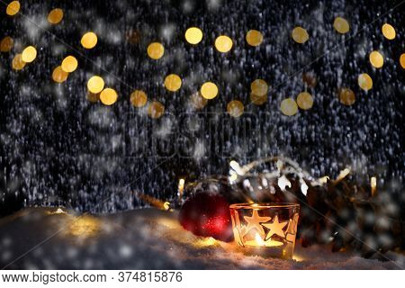 Christmas Theme With Candles, Snow, Pine Cone And Christmas Light