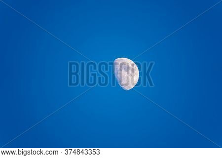 Detailed Image Of The Half Moon. Beautiful Half Moon On The Blue Clear Sky