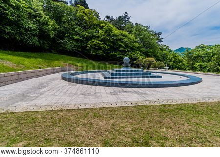 Circular Stepped Monument In Public Mountain Park