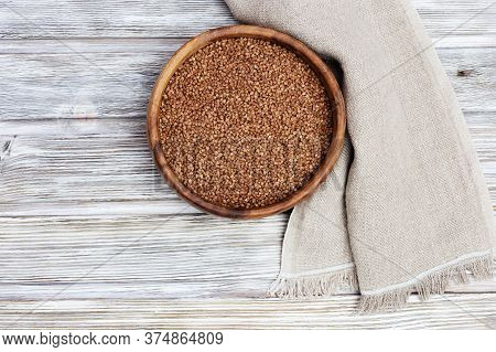Appetizing Buckwheats. Full Plate With Buckwheats On Wooden Background With Copy Space. Healthy Eati