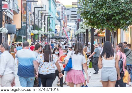 Andorra La Vella, Andorra : 2020 July 06 : People Walk In The Comercial Street Named Meritxell After