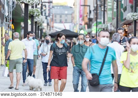 Andorra La Vella, Andorra : 2020 July 06 : People Walk In The Comercial Street Named Meritxell After