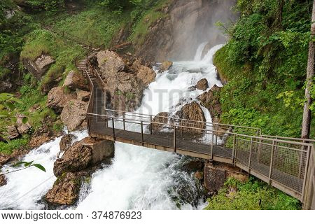 Bridge Over The River From The Gollinger Waterfall. Austria