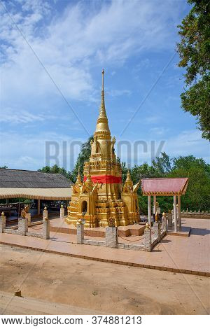 The Golden Pagoda At The Wat Ratchathammaram Buddhist Temple In Thailand On Koh Samui, A Local Templ