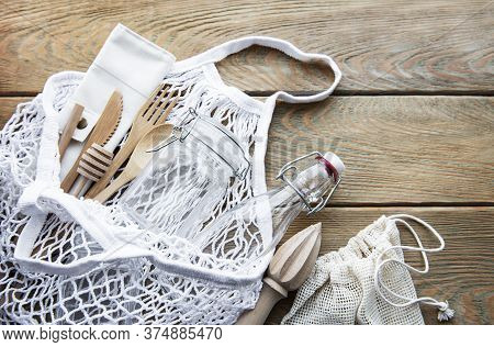 Cotton Bags, Net Bag With Reusable  Glass Jars, Bamboo And Wooden Cutlery. Zero Waste Concept. Eco F