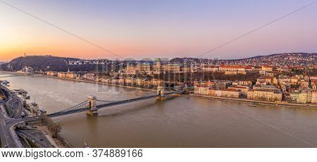 Panoramic Aerial Drone Shot Of Chain Bridge Over Danube River Buda Castle Before Budapest Sunrise