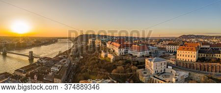 Panoramic Aerial Drone Shot Of Buda Castle On Buda Hill During Budapest Sunrise Morning Glow