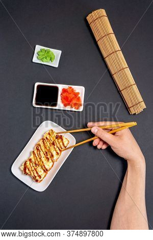 Sushi Rolly, Maki, Nigiri Set On Black Stone On Dark Background. Top View Flat Lay