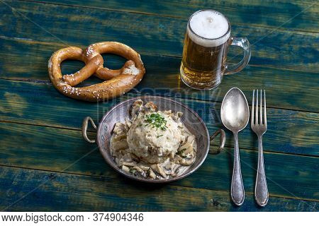 Overview Of Bavarian Bread Dumpling With Sauce