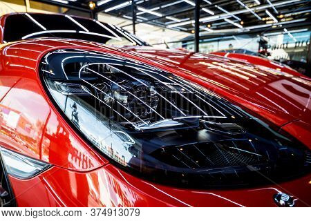 Headlights And Details Of Red Sport Car