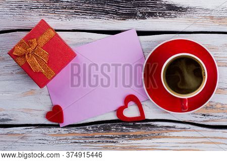 Flat Lay Morning Birthday Or Valentines Day. Blank Bink Paper, Gift Box And Cup Of Coffee. Topview F