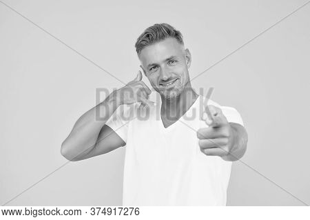 Call Me Right Now. Happy Man Show Call Me Gesture Pointing Finger. Call Centre Service. Sales Call. 