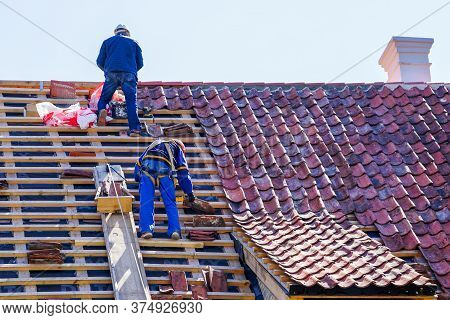 Roof Repair Of A Historic House And Replacement Of Clay Tiles