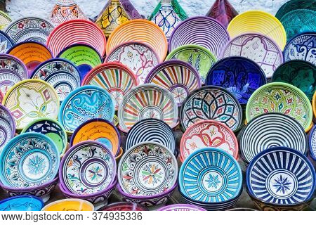 Red, Turquoise, Blue, Red, Orange, Yellow And Pink Decorative And Elaborate Patterns Of Bowls, Dishe