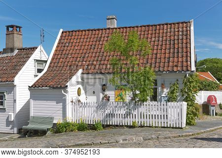 Traditional Wooden Houses In Gamle, Which Is A Historic Area Of The City Of Stavanger In Rogaland, N