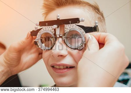 Trial Frame. Glasses For A Little Boy. Ametropia Correction With Glasses.
