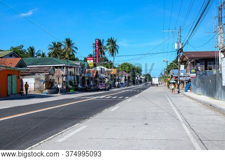 Dumaguete, The Philippines - 07 Apr 2020: Empty Highway Of Philippine Village During Coronavirus Qua
