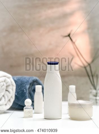 Closeup Of Toiletries Bathroom Setup In A Isolated White Tiles Background With Copy Space For Inscri