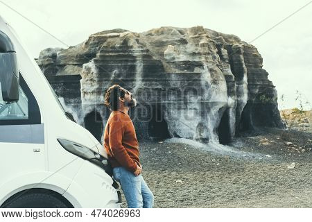One Driver Man Standing Outside The Vehicle And Enjoying Freedom Outdoors. Travel Camper Van Lifesty