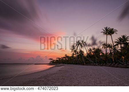 Palm Trees On Tropical Coast At Sunset. Crossroads Maldives, Saii Lagoon, June 2021. Long Exposure P
