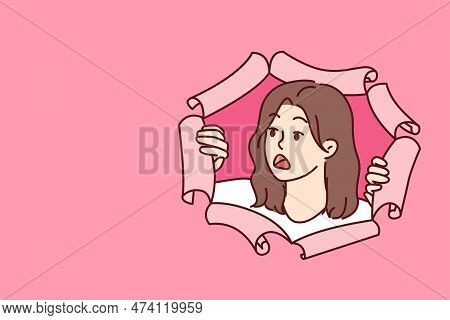 Shocked Woman Peeks Out Of Hole In Torn Paper And Looks Away After Seeing Unexpected Discount Or Pro