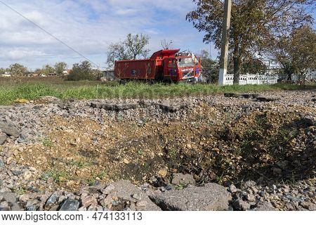 Myrolyubovka Village, Kherson Region, Ukraine - 10/24/2022: War In Damaged Truck Stands On The Side 