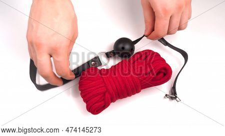 Hand Holding Mouth Gag. Items For Kinky Games. High Quality Photo