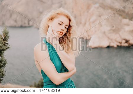Redhead Woman Portrait. Curly Redhead Young Caucasian Woman With Freckles Looking At Camera And Smil