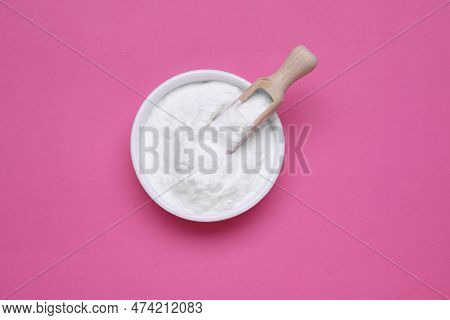 Bowl Of Sweet Powdered Fructose On Pink Background, Top View